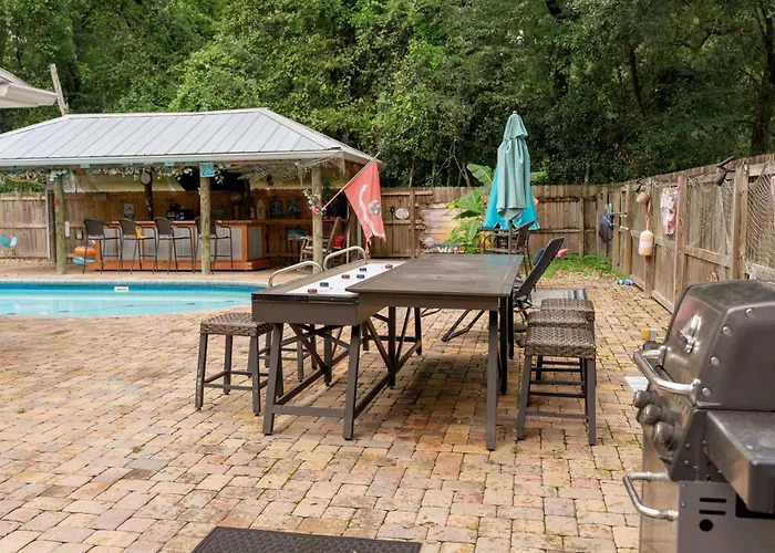 Jan's Oasis Family Retreat Pool Bar Games & Fun